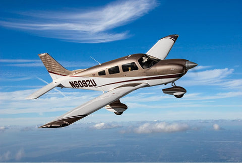 Piper Warrior training aircraft owned by LA Flight School parked on the ramp at Van Nuys Airport