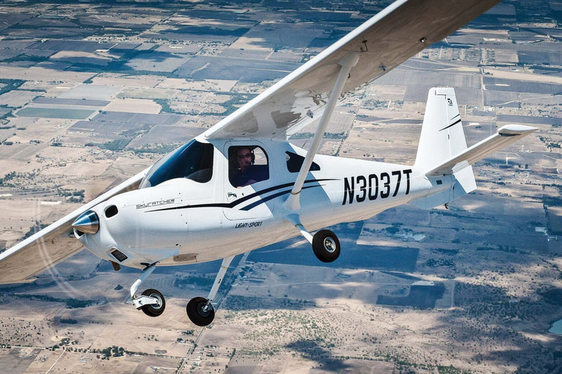 Training aircraft in flight above the San Fernando Valley on departure from Van Nuys Airport