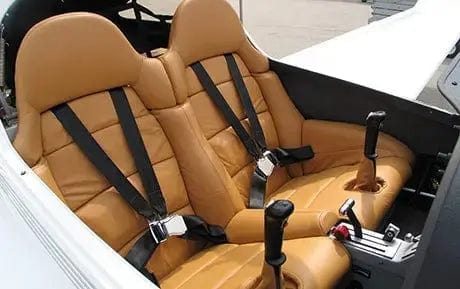 Tan leather seats and side-stick controls inside a Diamond DA20 trainer