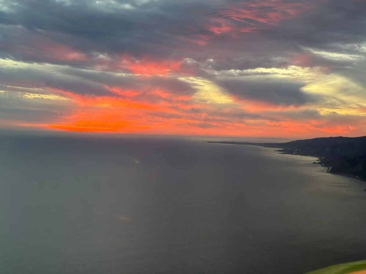 The Malibu coastline and Santa Monica Bay at sunset from the air